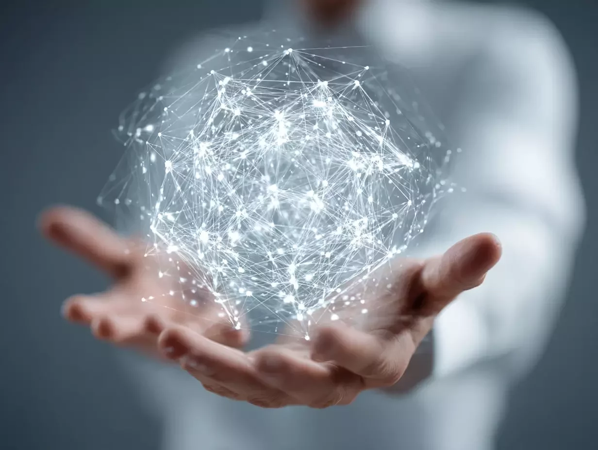 Visual representation of an IoT network in a person’s hands, symbolizing real-time data flow, connectivity, and smart sensor technology.